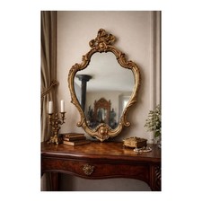 Ancien miroir en bronze doré