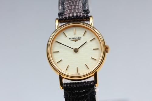 Presque comme neuve montre - [presque,