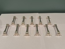 lot de 11 portes couteaux métal argenté modèle coquille