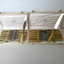 2 sets of 12 knives horn sleeves freezer blades