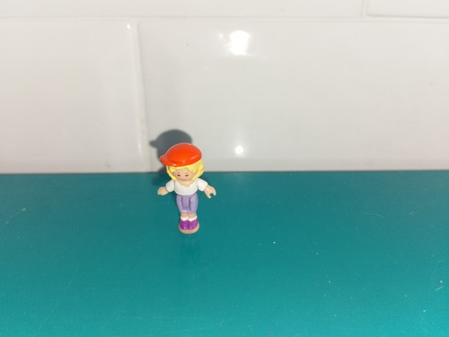 Polly pocket figurine doll