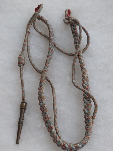 Une fourragère croix - , du
