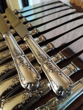 12 table knives floral decor and silver metal foliage