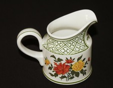 Petit pot à lait en faïence