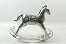  CHEVAL A BASCULE DECORATIF EN METAL ARGENTE, 25 cm