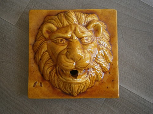 Tête lion ornement - de,