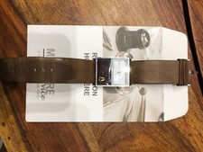 montre femme Nixon marron avec bracelet en cuir comme neuve 