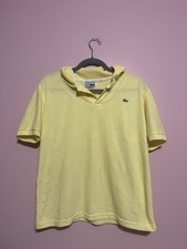 Polo Lacoste jaune taille M en