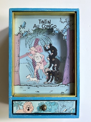 Boîte musique tintin au - à,