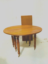 table Louis Philippe à six pieds à abattant en merisier massif . XIX siècle .