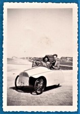 vintage photo couple in large pedal toy car 1945 Belgium cuistax