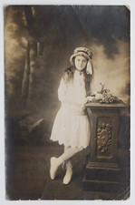 Girl poses cross feet, white dress - old photo snapshot RPPC