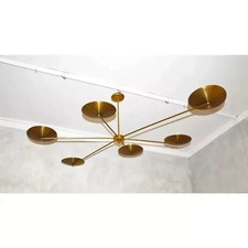 Lustre moderne en laiton brut