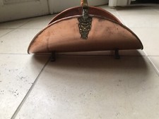 Porte buche en cuivre et pieds