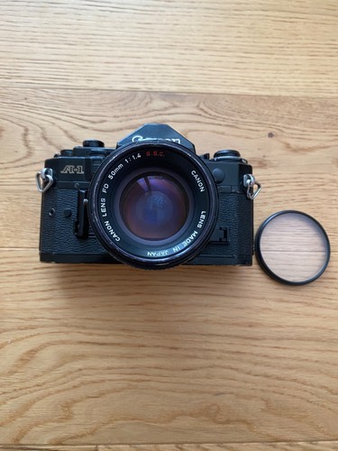 Canon objectif - a-1, +