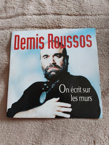Demis roussos écrit sur - demis,