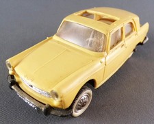 Norev No. 51 Peugeot 404 yellow sunroof servo steering 1/43