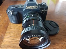 Reflex argentique CANON T50 avec zoom Makinon 28/80 Pour décoration / exposition