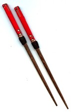 Pair of JAPANESE ORNAMENTAL RODS, fabric covered handle »