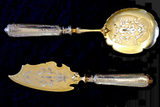 couverts de service à glace argent et métal doré