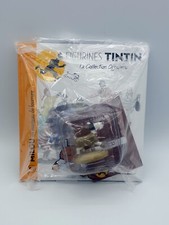 61 - Milou - en manteau de