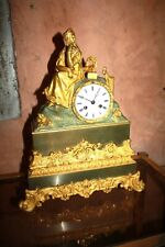Gilded bronze clock woman books and harp 18th restoration French clock Ormolu