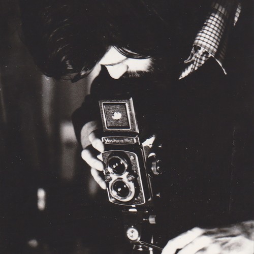 Photographe ajustant