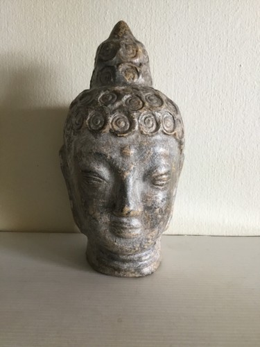 Tête bouddha terre - de,