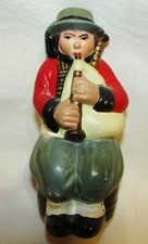 BRETON PIGGY BANK IN ANTIQUE PAINTED PLASTER COSTUME
