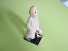 TINTIN EN IMPERMEABLE LEBLON