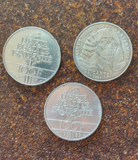 3 pièces de 100 francs