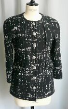CHANEL Petite Veste tweed