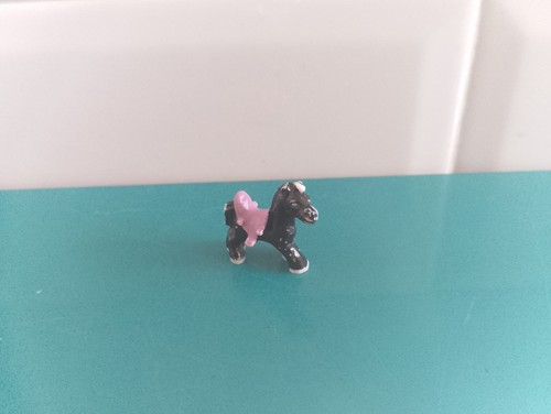 Polly pocket figurine doll