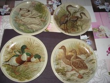 4 assiettes décoratives en