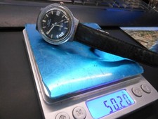 Kelton Automatic,bracelet cuir,WaterRésistant 25 mètres,fonctionne,guichet,D38mm