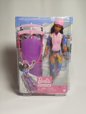 Poupée BARBIE et sa luge