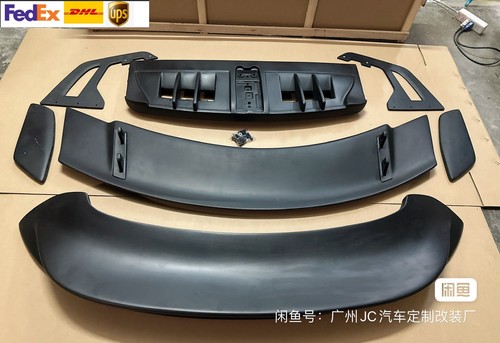 Upainted rear trunk spoiler - rear,