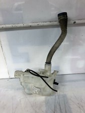 Bouteille et pompe lave vitre