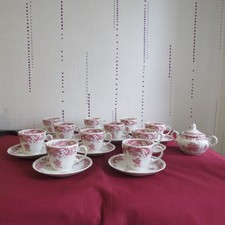 11  tasses + sucrier en