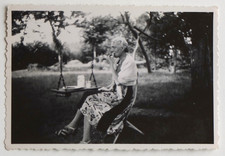 Woman lunch garden swing picnic unusual - old photo snapshot