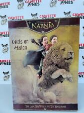 GIRLS ON ASLAN STATUE –