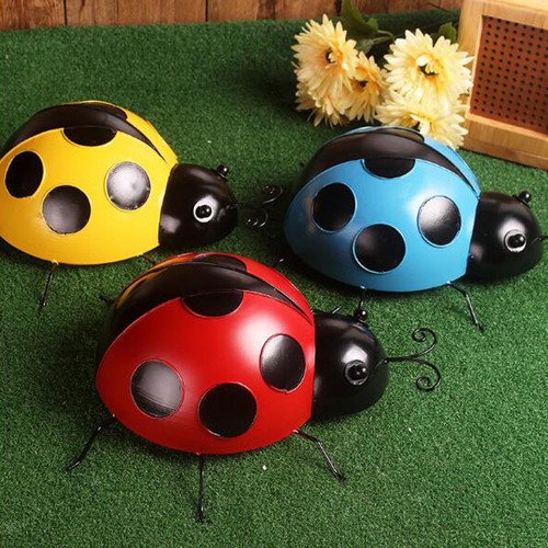 Sculpture coccinelle - de,