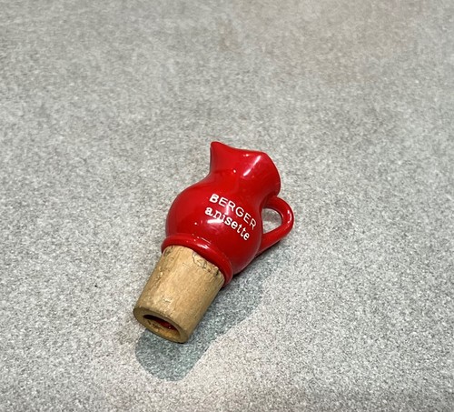 Old red pvc spout dispenser - red,