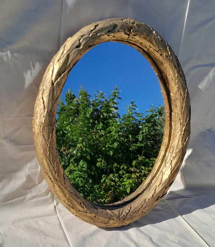 Ancien miroir ovale sculpté