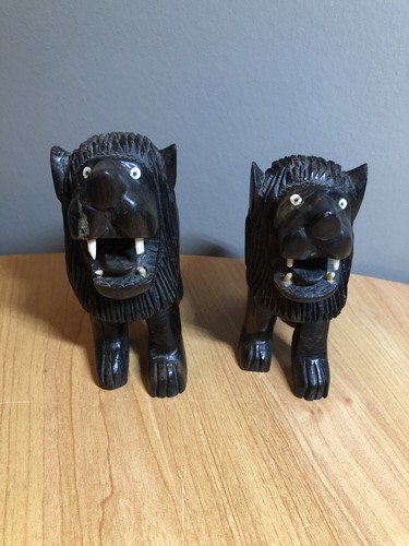Lot lions sculptés en - 2,
