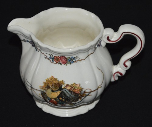 Ancien petit pot - à, lait