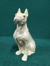 SCULPTURE DE CHIEN EN TERRE