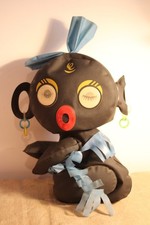 Ancienne poupée publicitaire