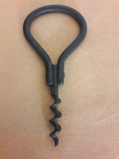 ANCIEN TIRE BOUCHONS EN FER 