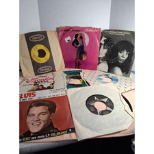 8 45RPM Records, In Good Condition.